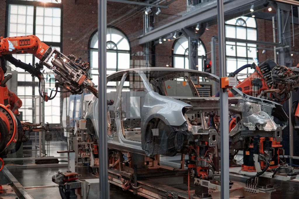 Manufacturing robots assembling a car